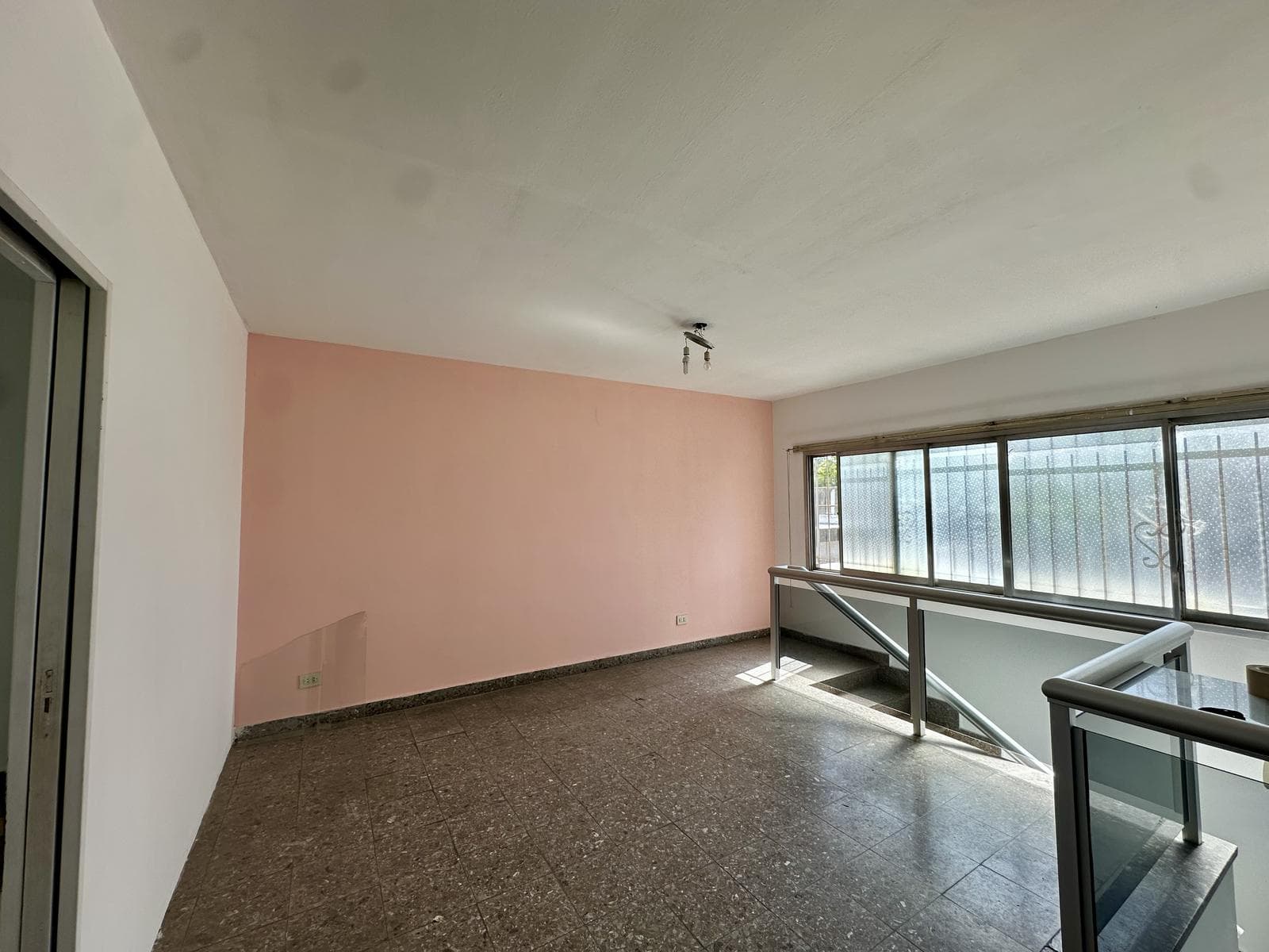 2-bedroom townhouse for sale. Front balcony. Downtown Campana