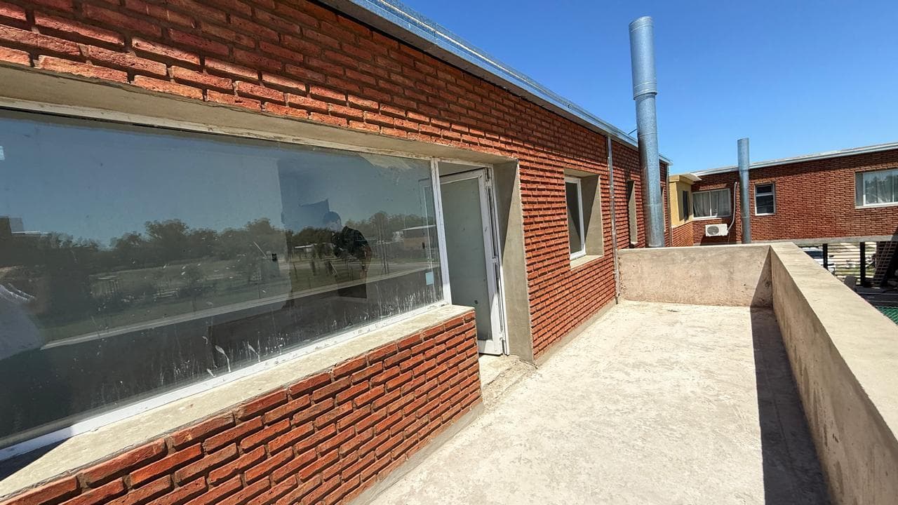 For Sale/Financing Available: Two-Bedroom House with Garage, Barbecue Area, and Garden. Ibarlucea