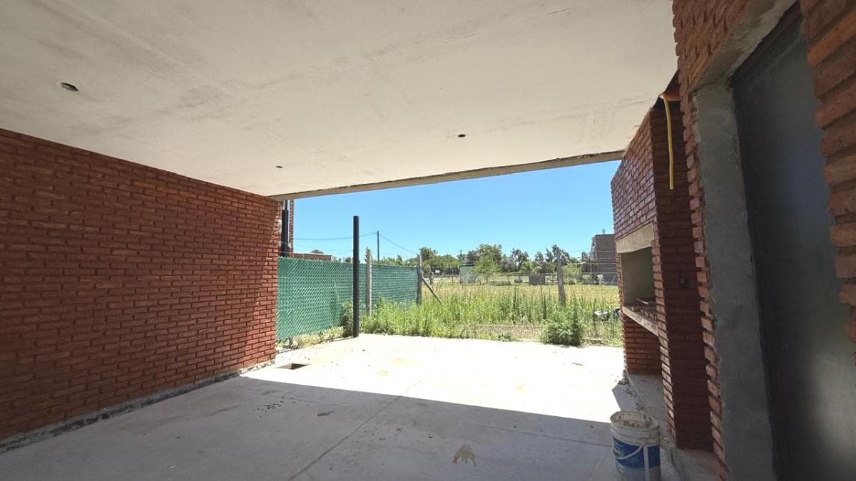 For Sale/Financing Available: Two-Bedroom House with Garage, Barbecue Area, and Garden. Ibarlucea
