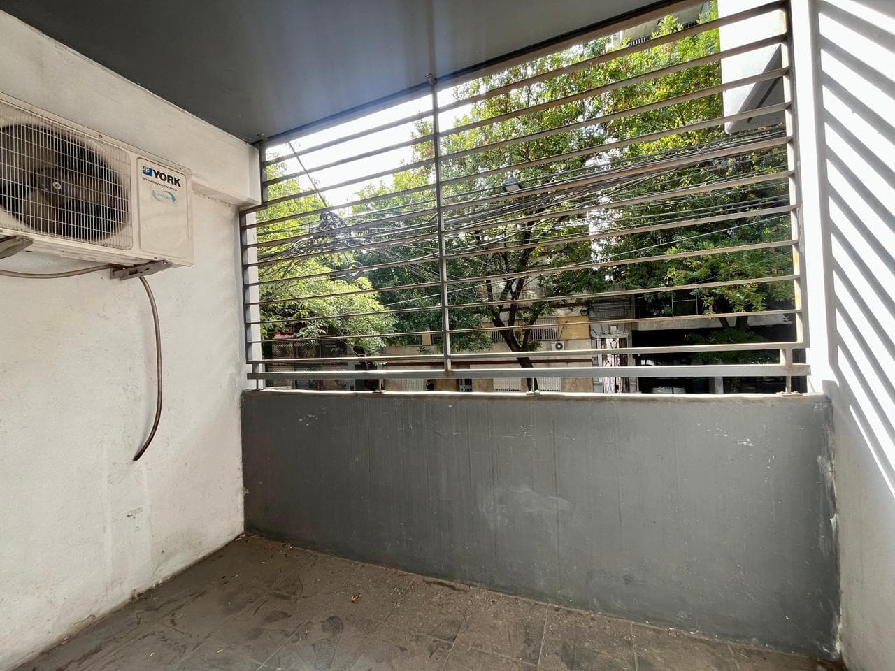 FOR SALE - 2-bedroom apartment with two balconies and a garage. Abasto, Rosario.