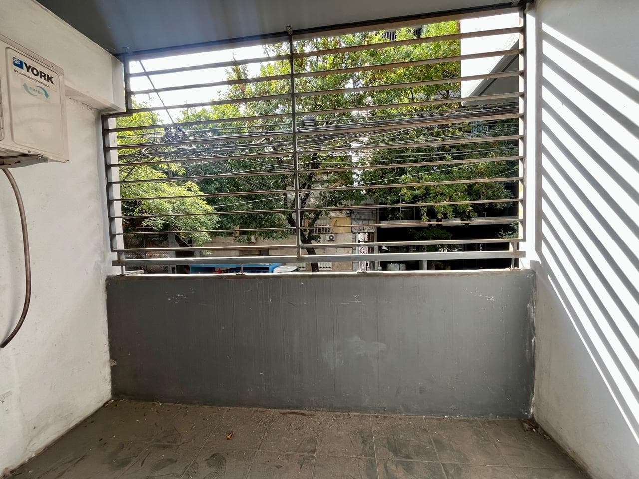 FOR SALE - 2-bedroom apartment with two balconies and a garage. Abasto, Rosario.
