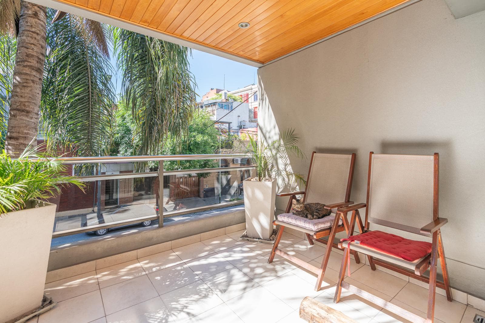 Modern 4-room apartment with a garage. Front patio and balcony terrace.