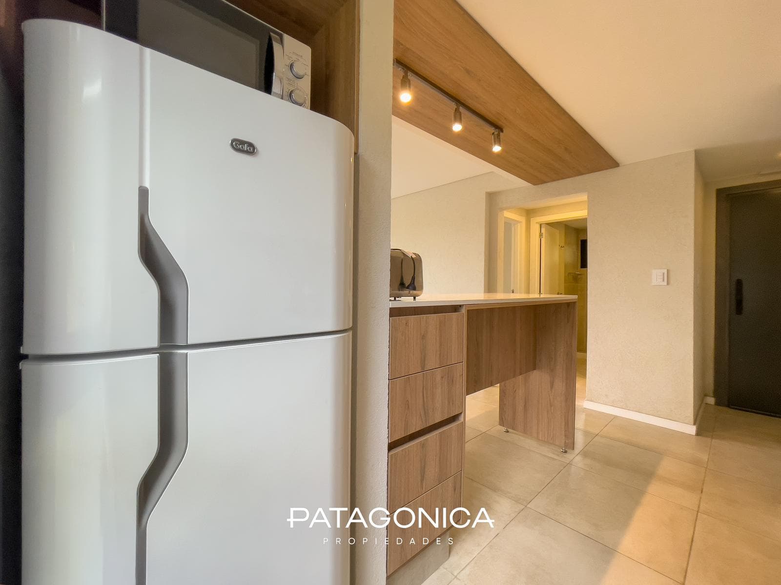FOR SALE—2-ROOM APARTMENT WITH COVERED PARKING SPACE, DECK, AND GARDEN. EL MERCADO NEIGHBORHOOD, VILLA LA ANGOSTURA