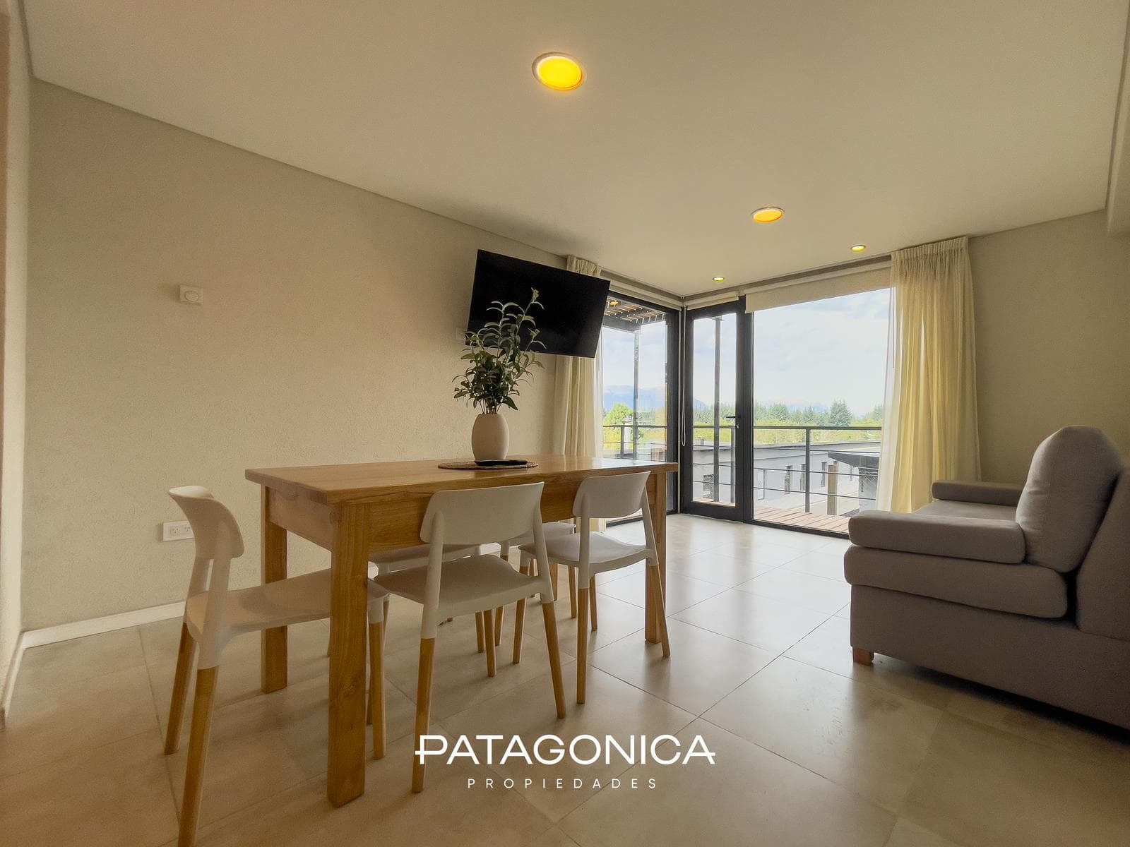 FOR SALE—2-ROOM APARTMENT WITH COVERED PARKING SPACE, DECK, AND GARDEN. EL MERCADO NEIGHBORHOOD, VILLA LA ANGOSTURA
