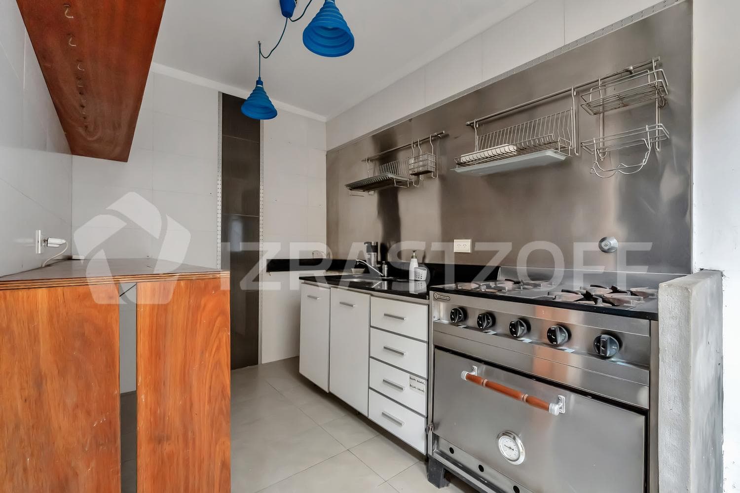 For Sale: Renovated Townhouse with Private Patio on Two Floors, Featuring a Grill