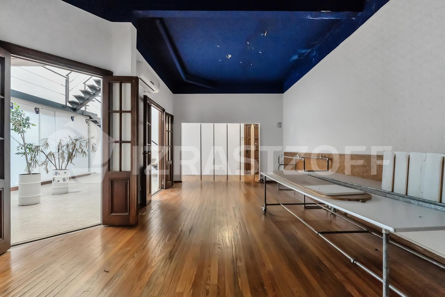 For Sale: Renovated Townhouse with Private Patio on Two Floors, Featuring a Grill