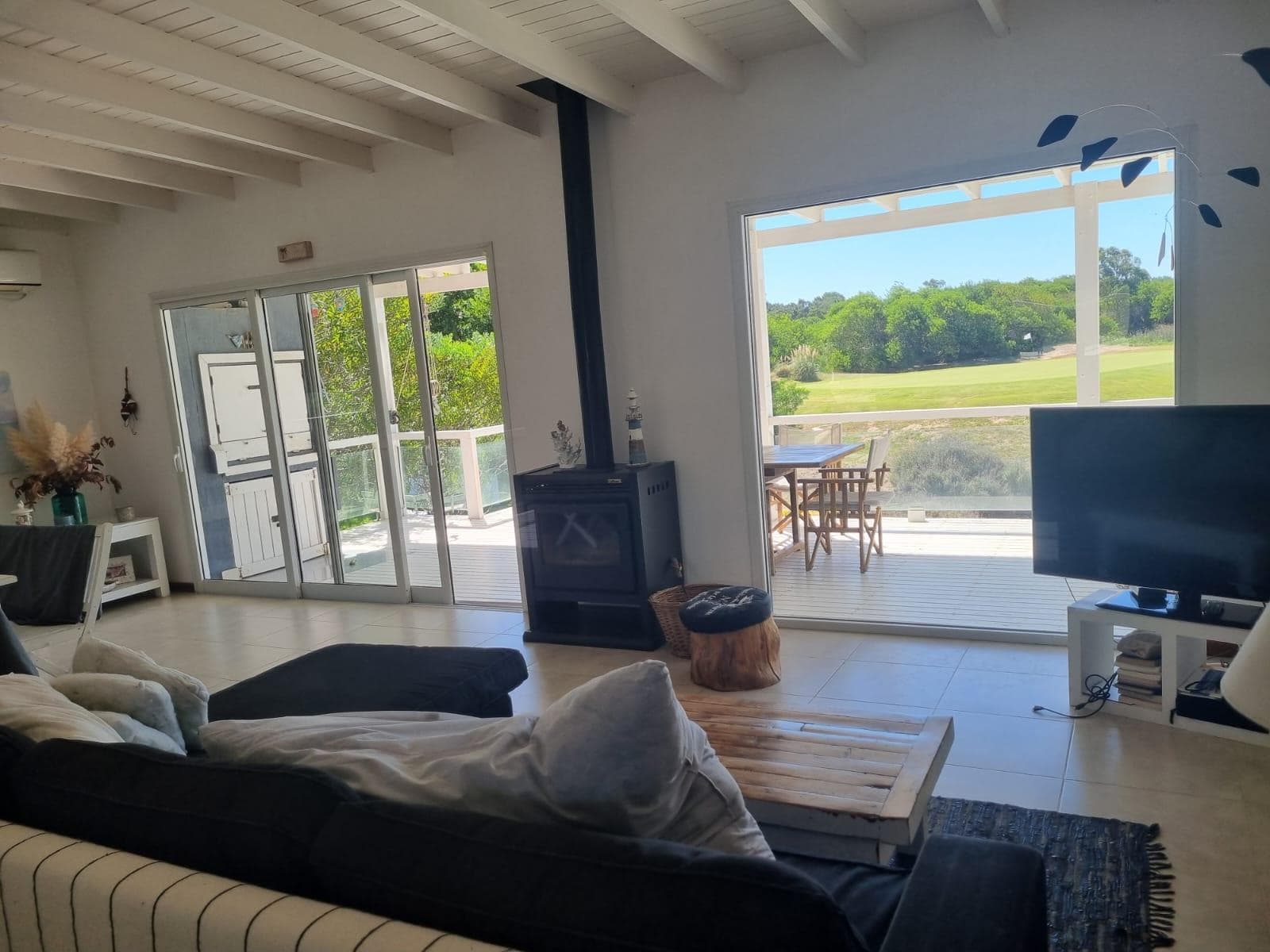 A beautiful house in Costa Esmeralda Golf 2, with a pool, a barbecue, and a view of the golf course.