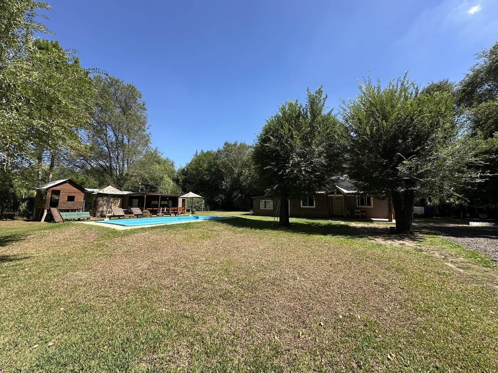 3-Bedroom Country House for Sale. Large green park with a pool and barbecue area. Los Cardales, Santa Brigida