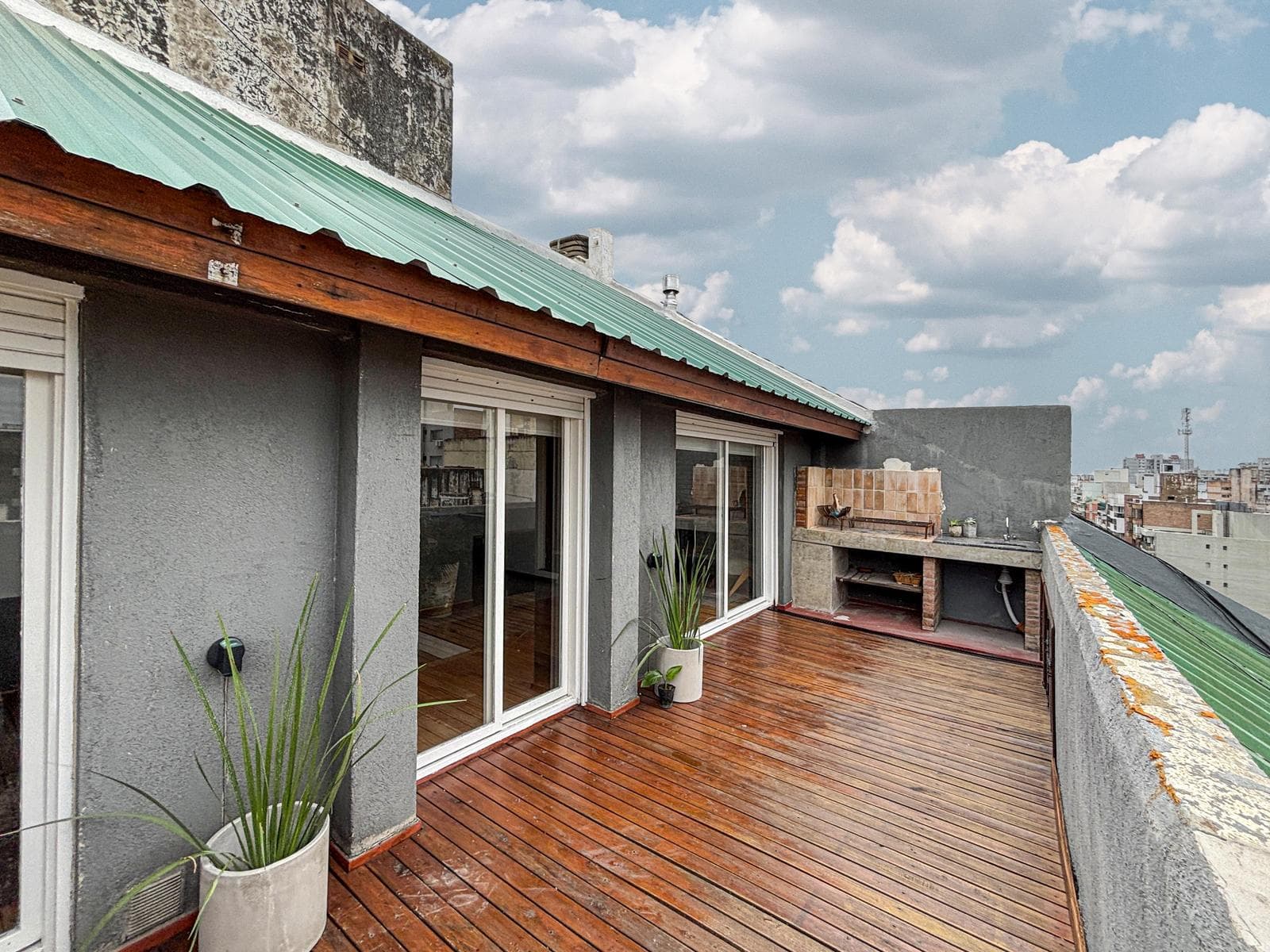 Unique 2-bedroom apartment with a multipurpose room, terrace, and grill