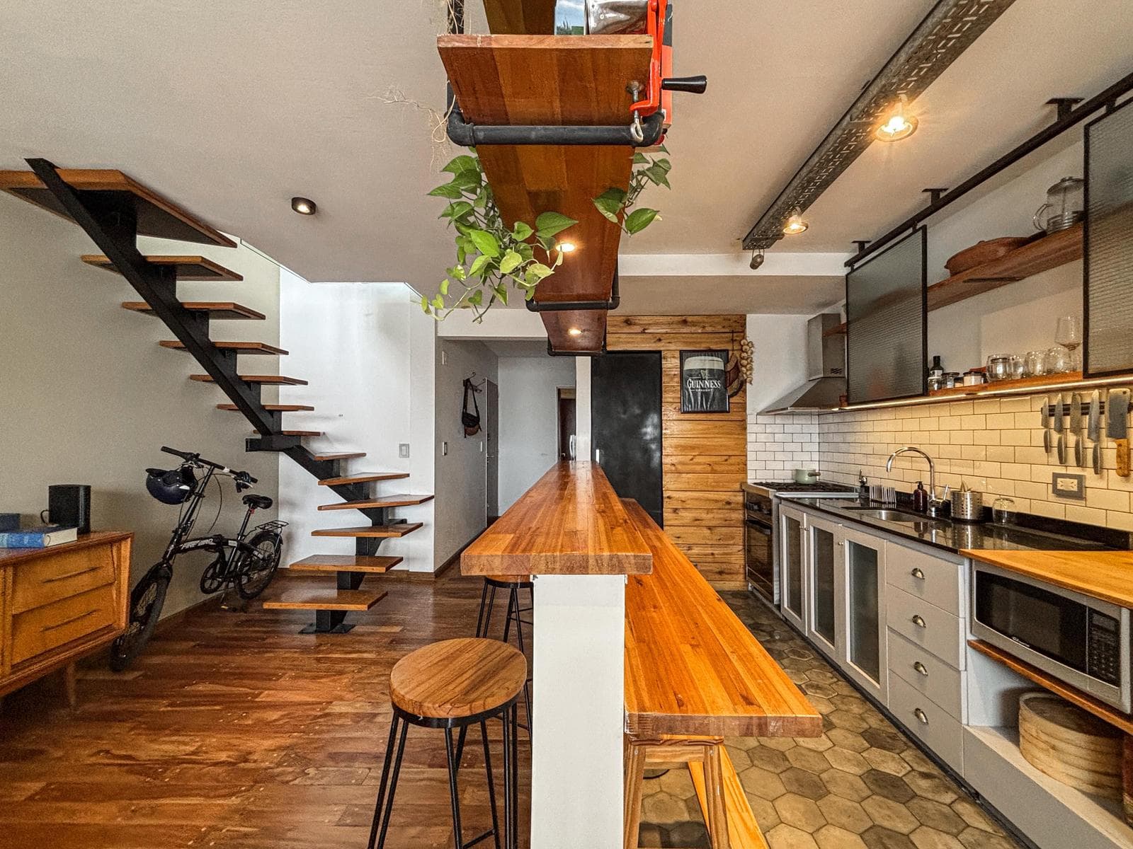 Unique 2-bedroom apartment with a multipurpose room, terrace, and grill