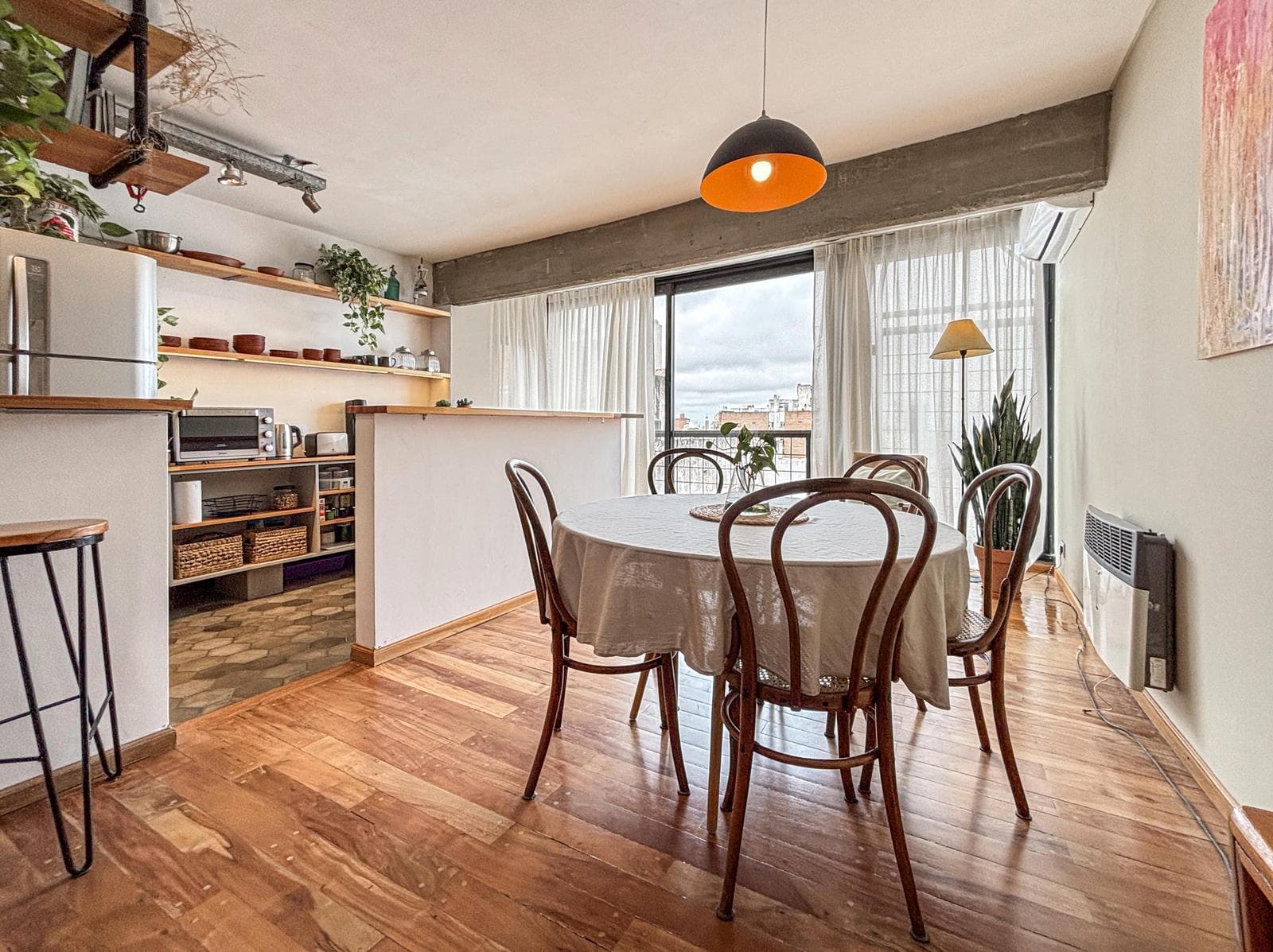 Unique 2-bedroom apartment with a multipurpose room, terrace, and grill