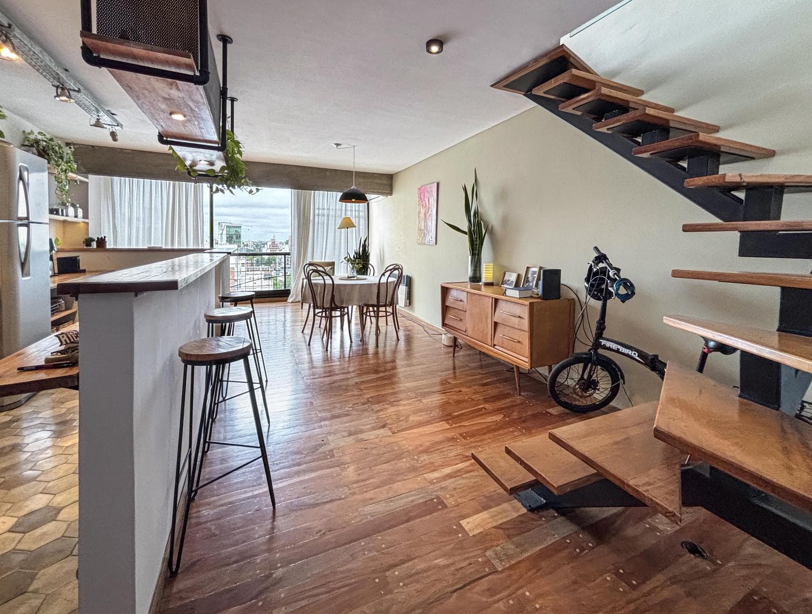 Unique 2-bedroom apartment with a multipurpose room, terrace, and grill