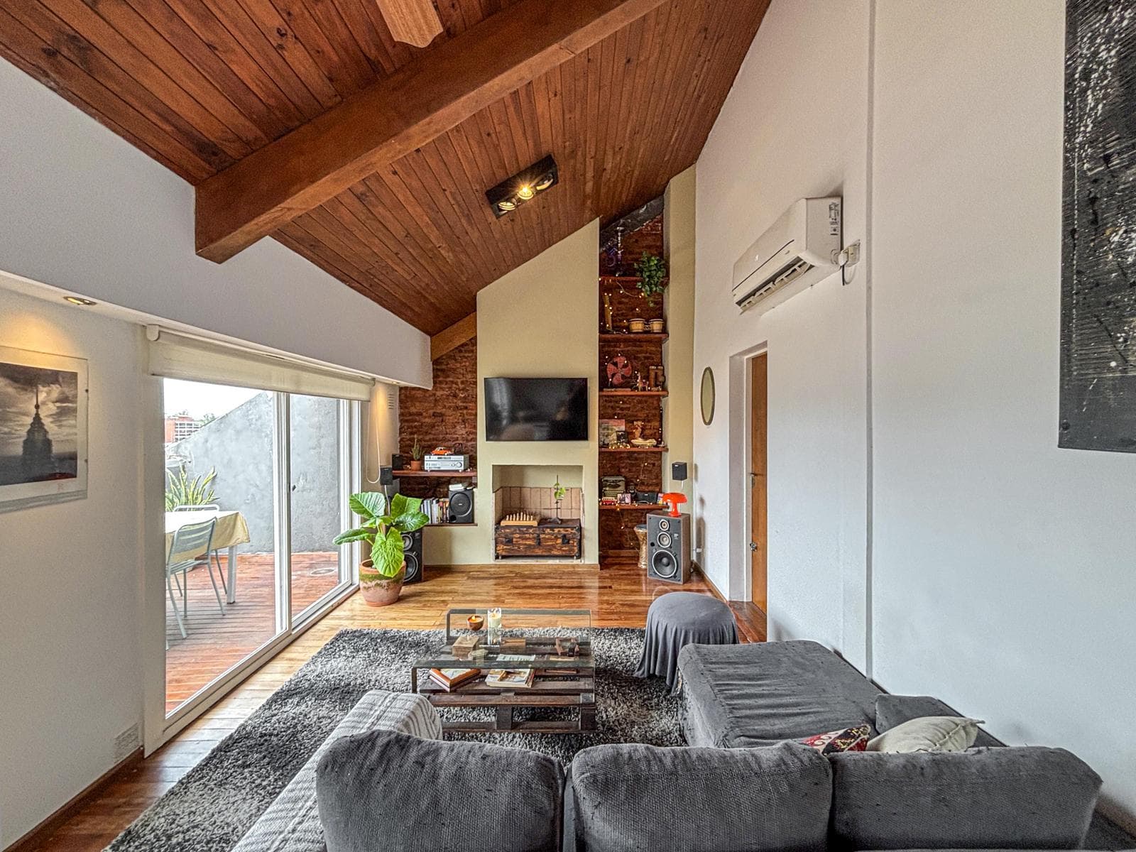Unique 2-bedroom apartment with a multipurpose room, terrace, and grill