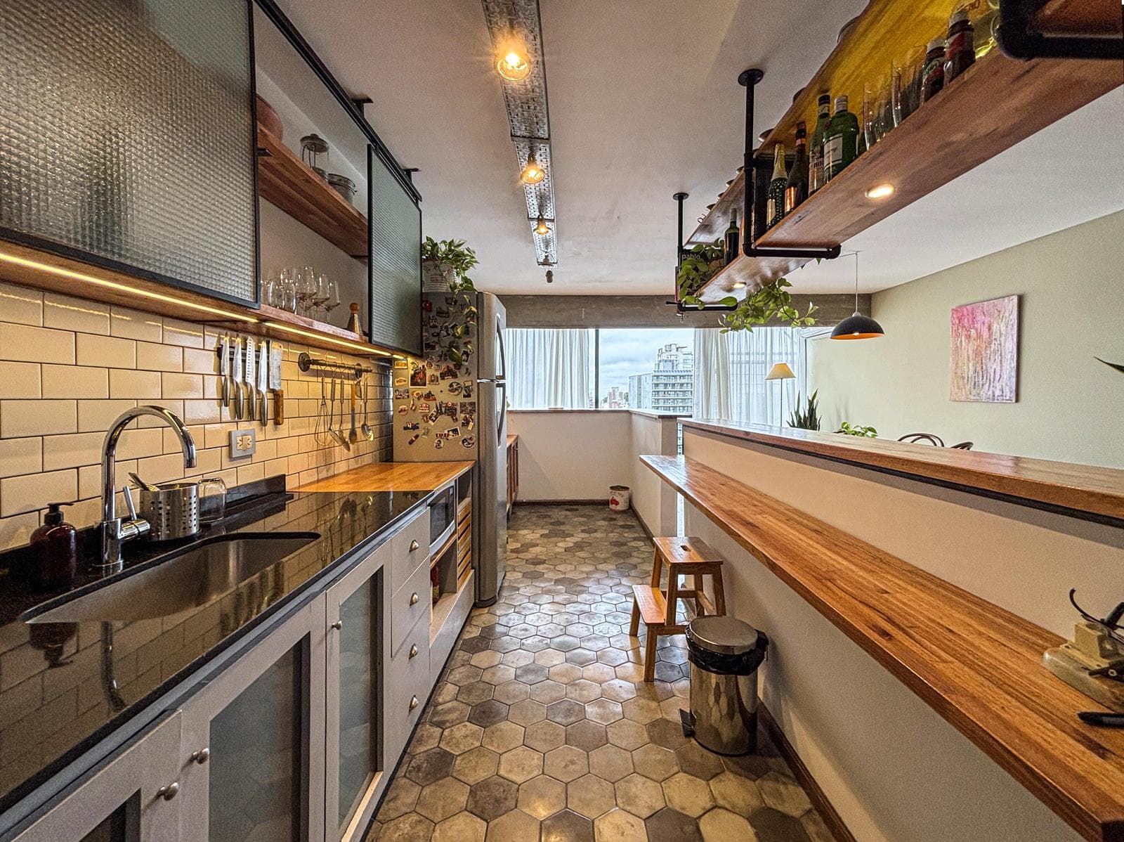 Unique 2-bedroom apartment with a multipurpose room, terrace, and grill
