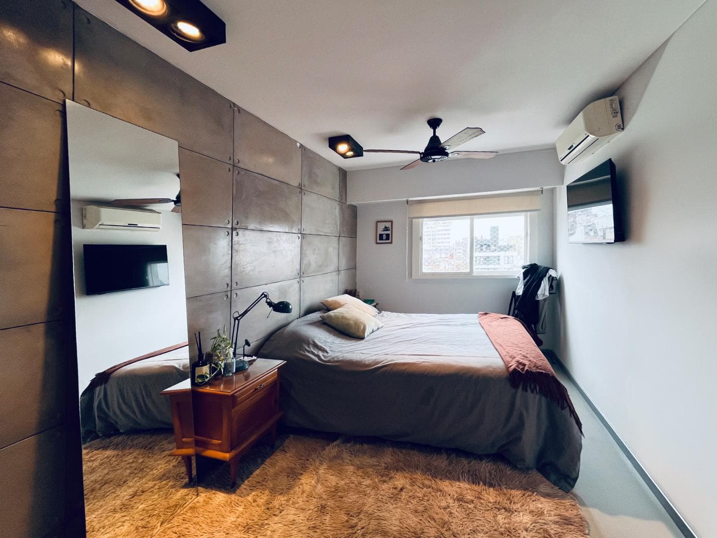 Unique 2-bedroom apartment with a multipurpose room, terrace, and grill