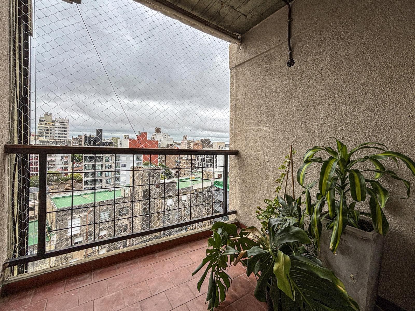 Unique 2-bedroom apartment with a multipurpose room, terrace, and grill