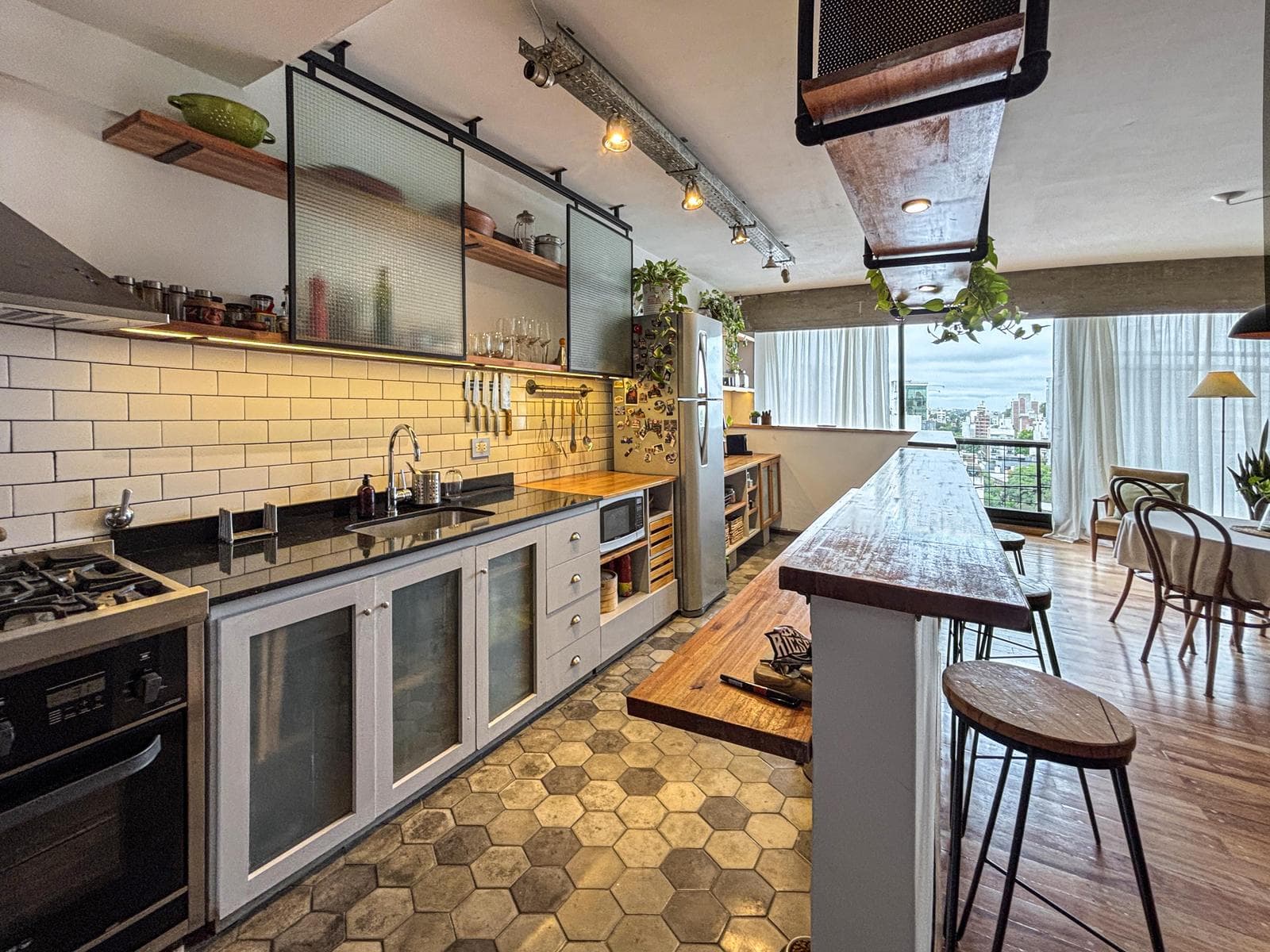 Unique 2-bedroom apartment with a multipurpose room, terrace, and grill