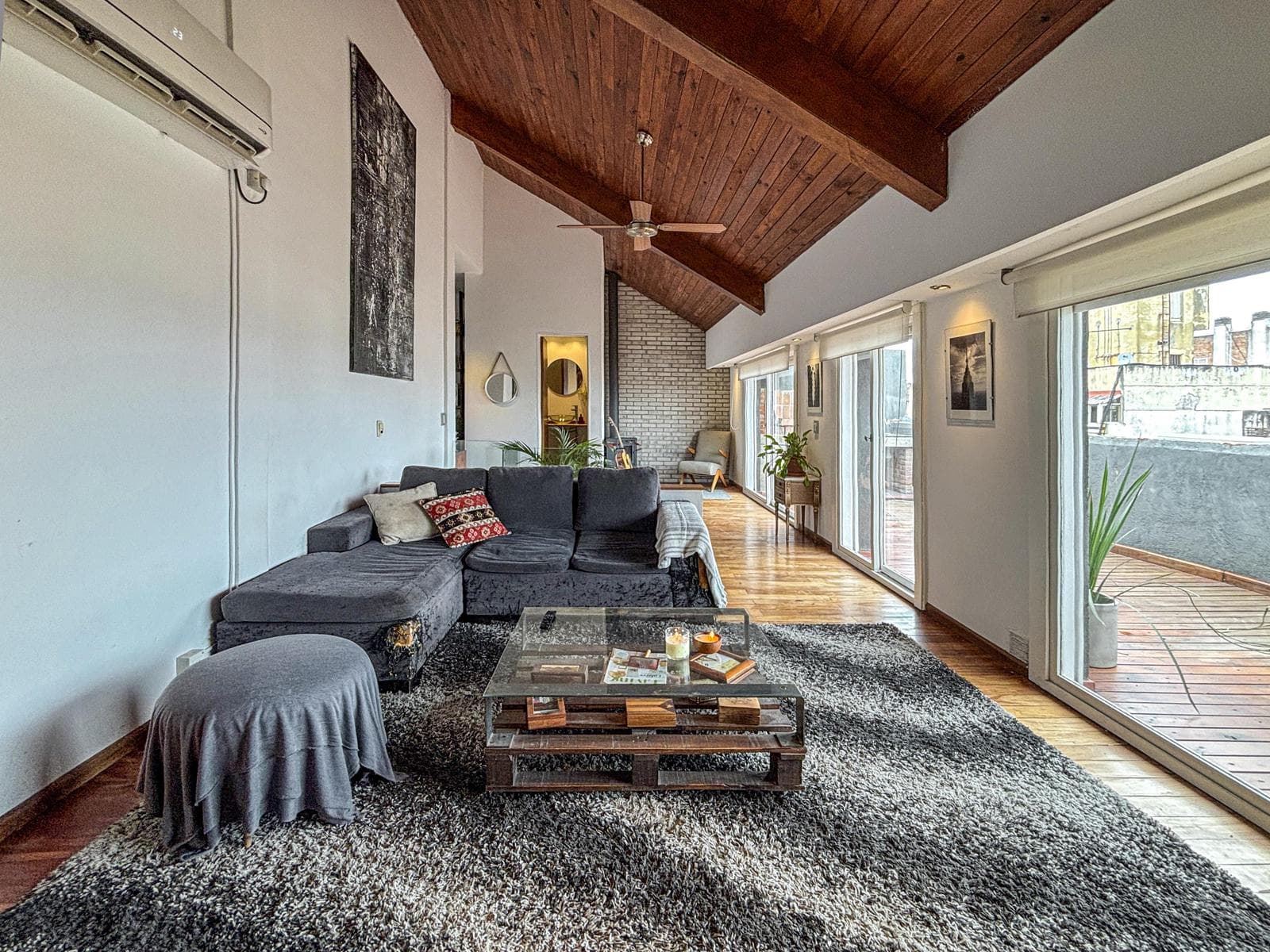 Unique 2-bedroom apartment with a multipurpose room, terrace, and grill