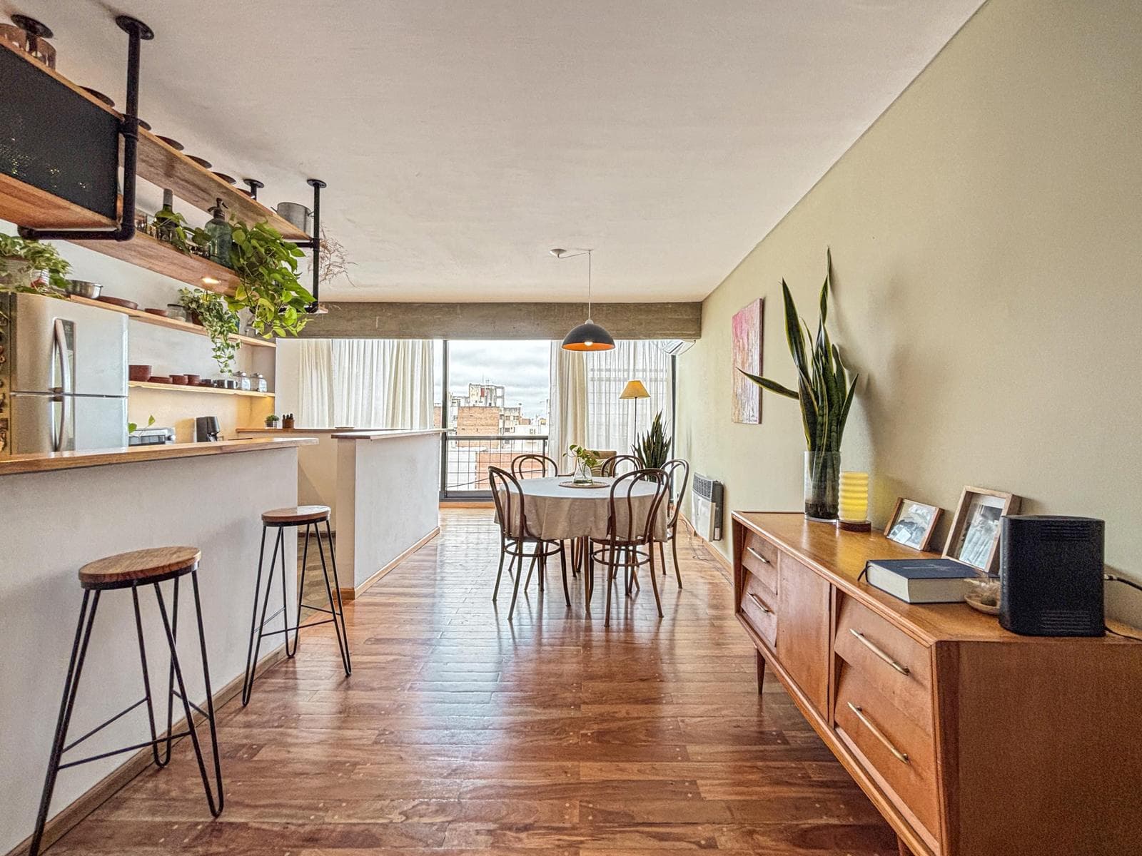 Unique 2-bedroom apartment with a multipurpose room, terrace, and grill
