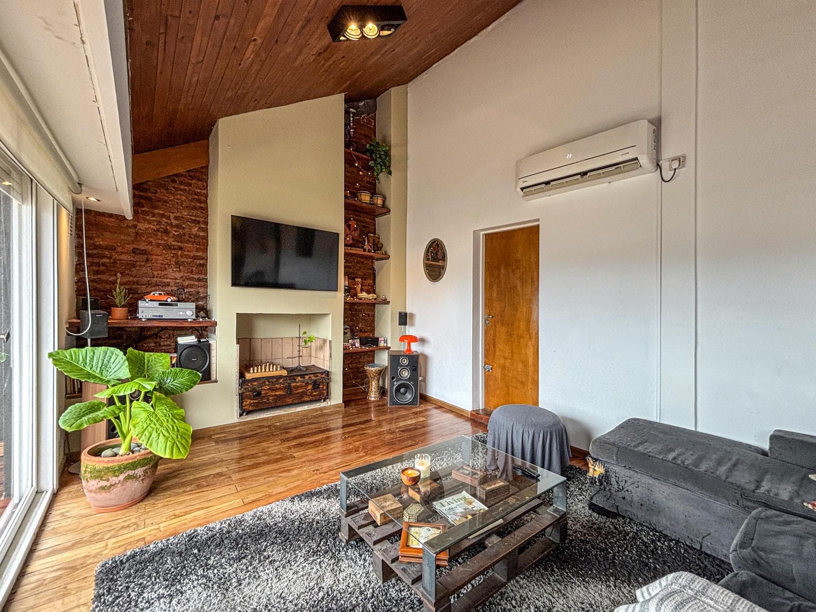 Unique 2-bedroom apartment with a multipurpose room, terrace, and grill