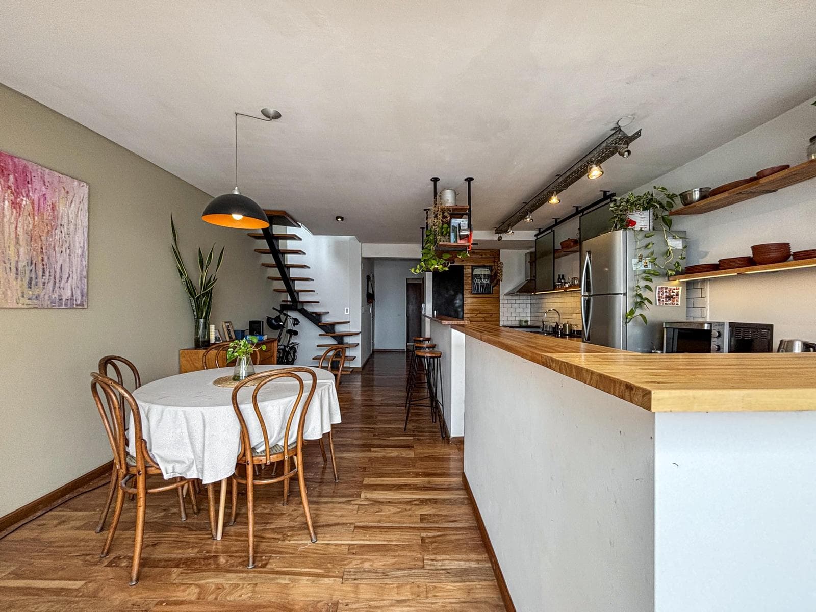 Unique 2-bedroom apartment with a multipurpose room, terrace, and grill
