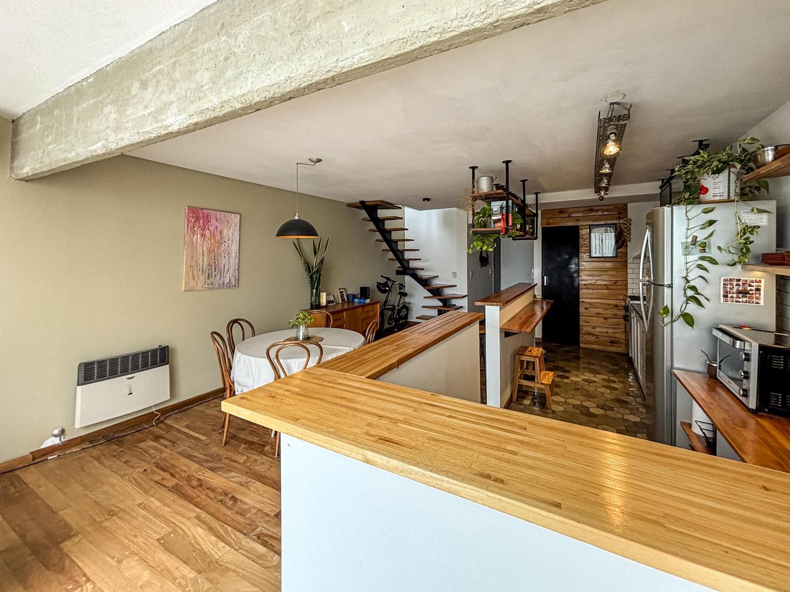 Unique 2-bedroom apartment with a multipurpose room, terrace, and grill