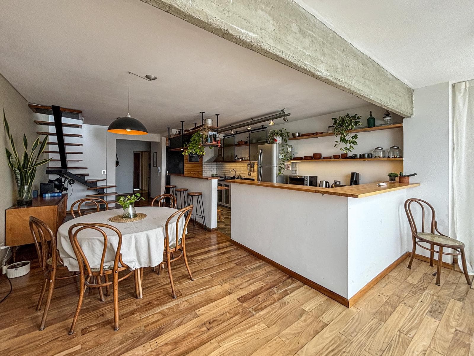 Unique 2-bedroom apartment with a multipurpose room, terrace, and grill