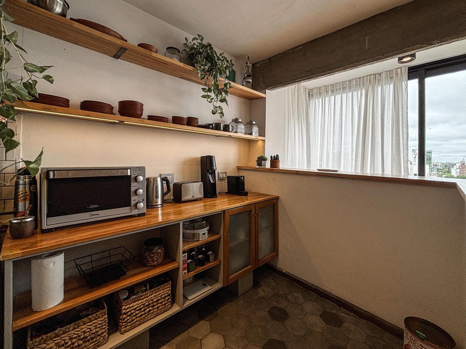 Unique 2-bedroom apartment with a multipurpose room, terrace, and grill
