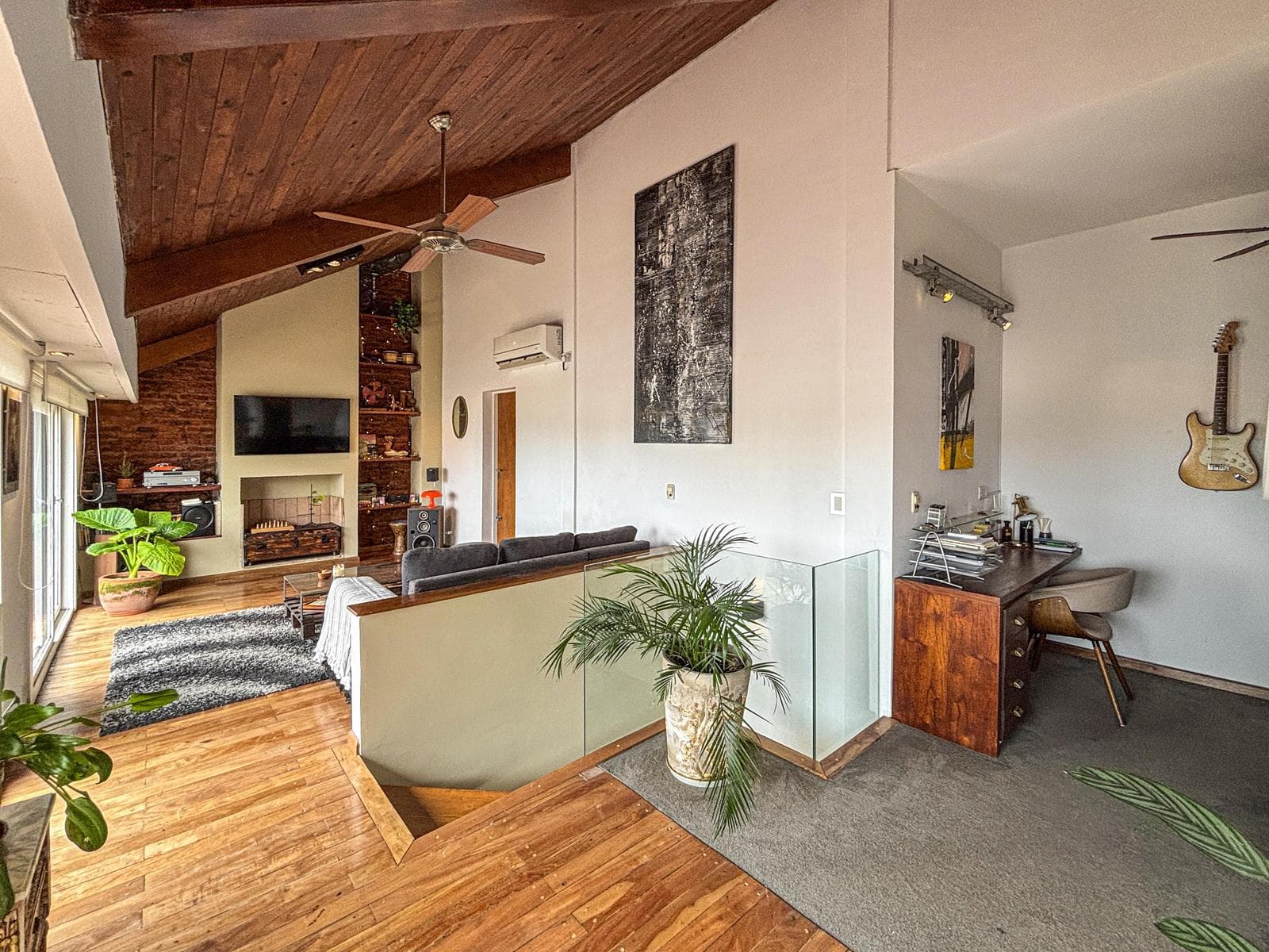Unique 2-bedroom apartment with a multipurpose room, terrace, and grill
