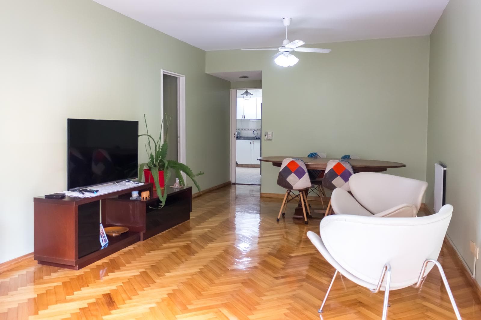 Four-room apartment for sale in Palermo with a maid's quarters, a front-facing balcony, and a storage room