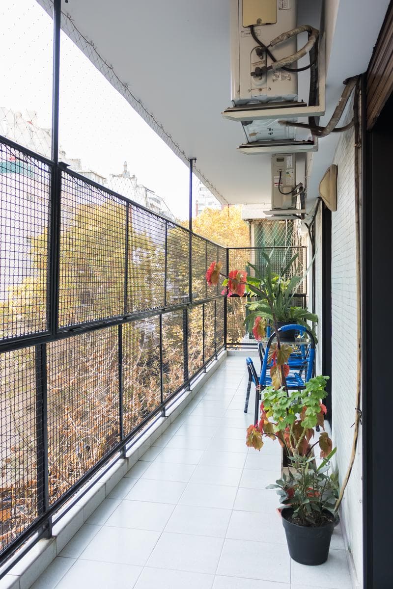 Four-room apartment for sale in Palermo with a maid's quarters, a front-facing balcony, and a storage room
