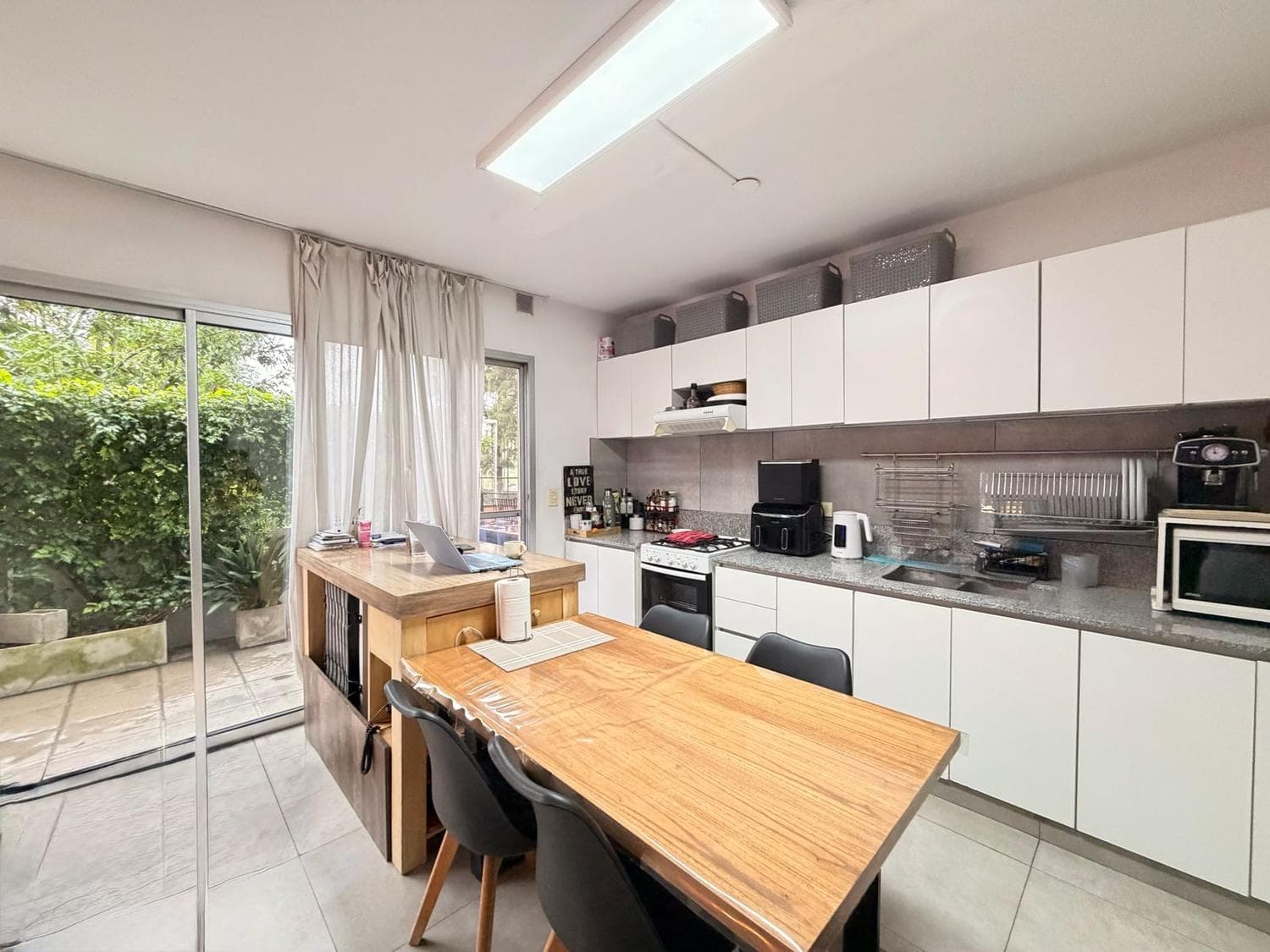 Two-bedroom apartment for sale with a large, wide balcony