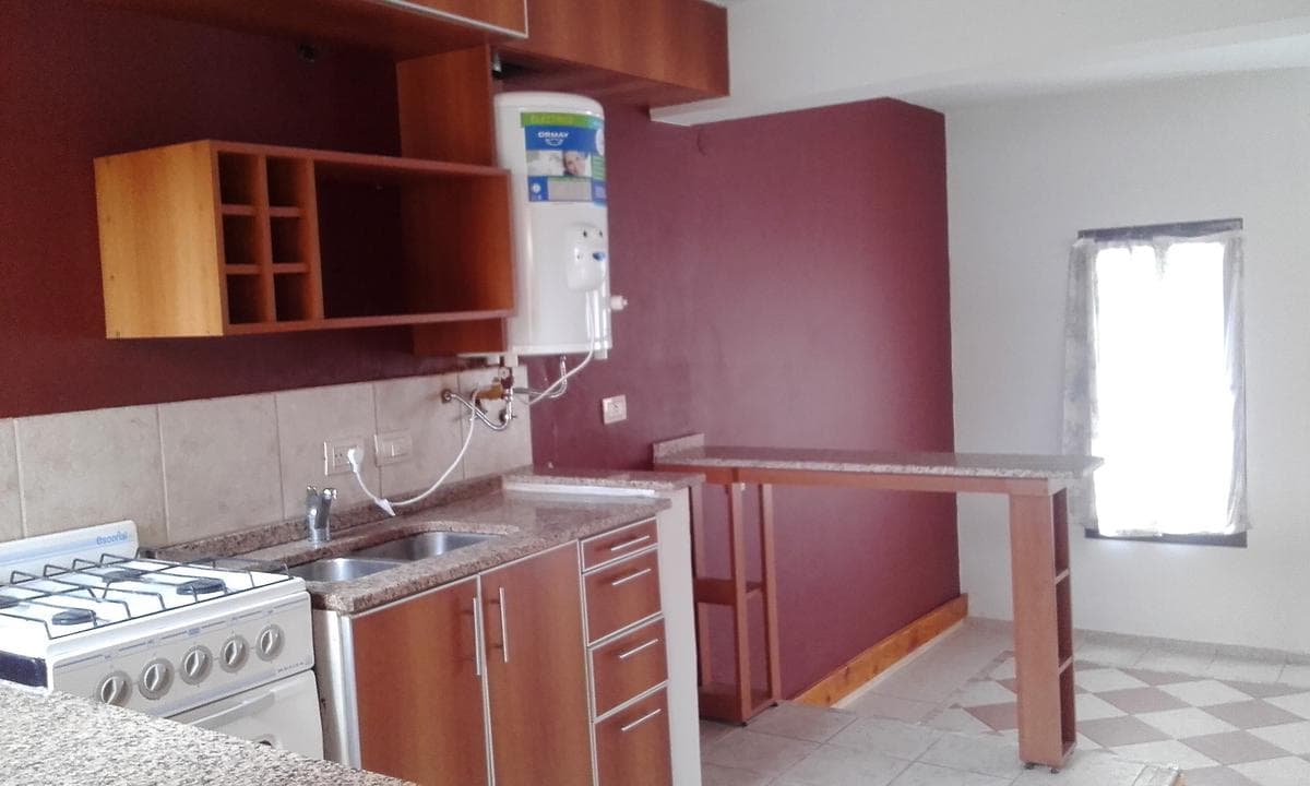 2-bedroom duplex for sale with a beautiful view, located on a paved street 5 blocks from downtown, west-facing, with natural gas available on the street, in a residential neighborhood