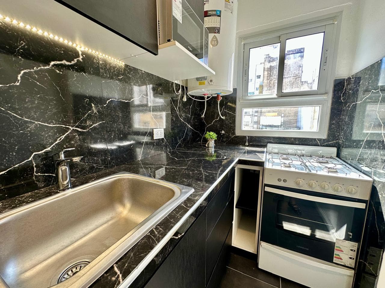 2-Room Apartment, Partially Renovated, Furnished, Side View of the Ocean