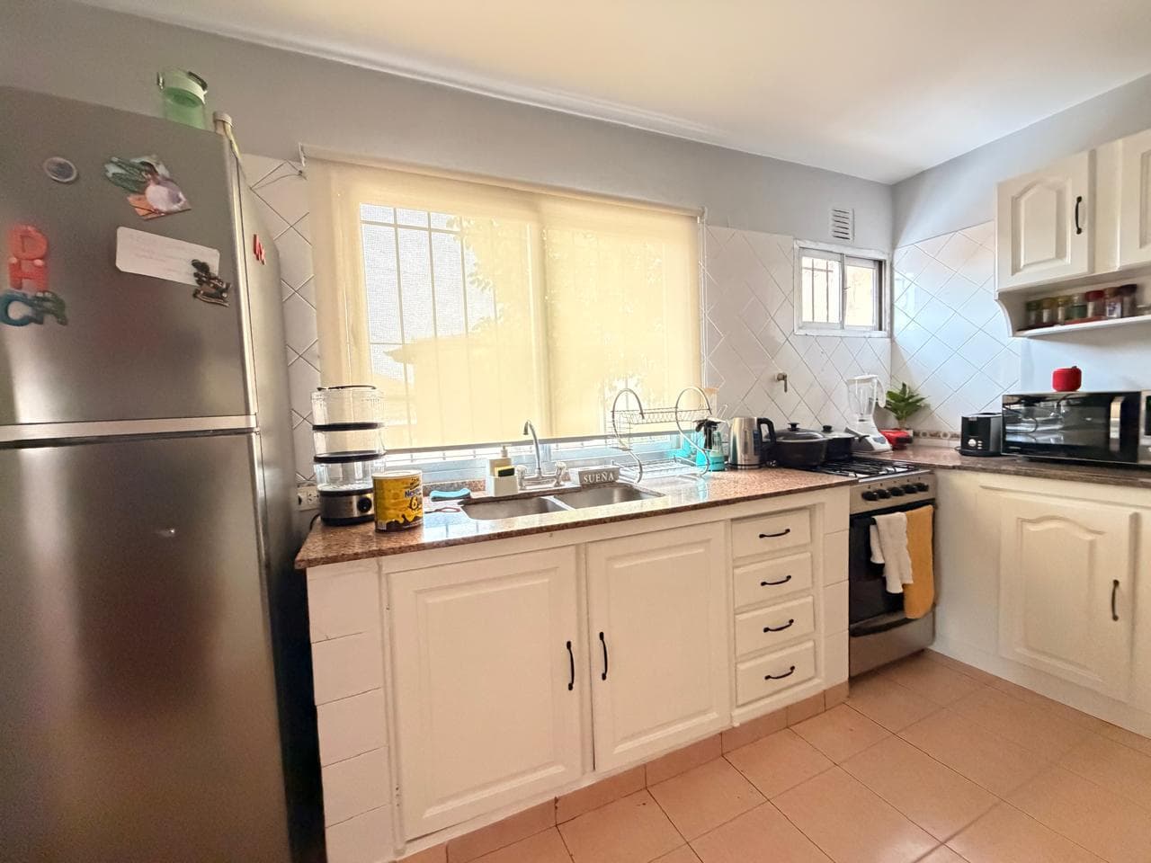 First-floor house for sale—featuring a studio apartment or a separate street-facing commercial space, ideal for renting out