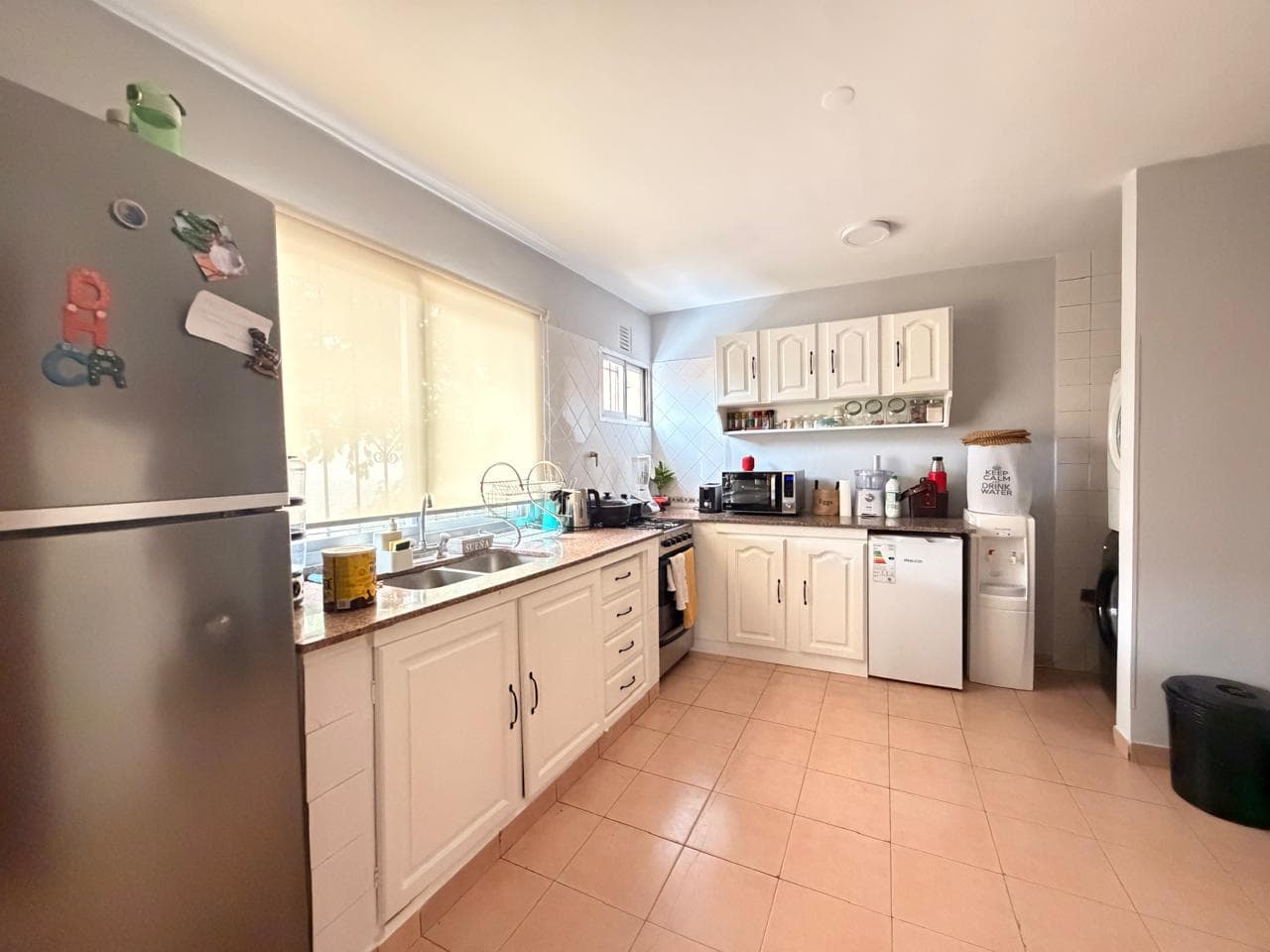 First-floor house for sale—featuring a studio apartment or a separate street-facing commercial space, ideal for renting out