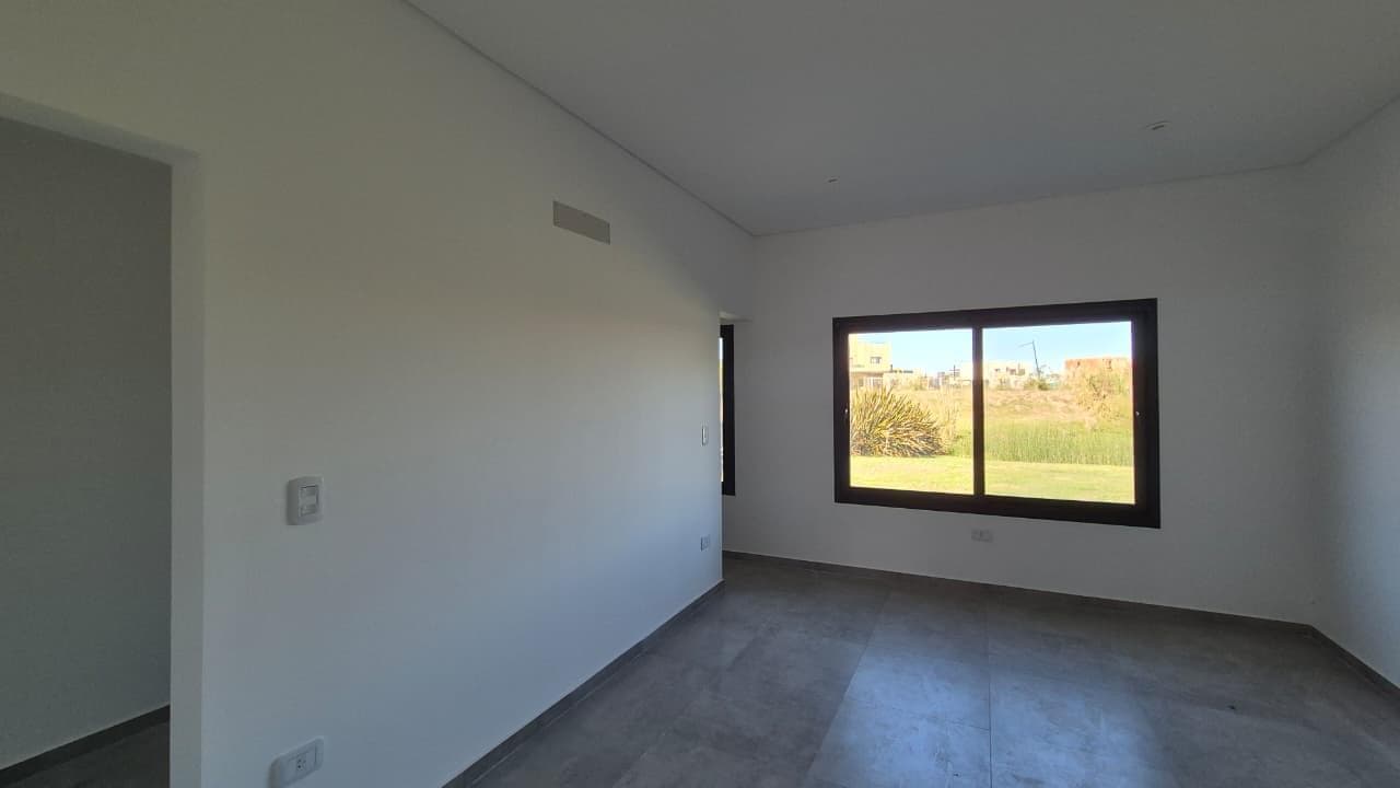 FOR SALE: Brand-new single-story house in Canton Norte overlooking a body of water