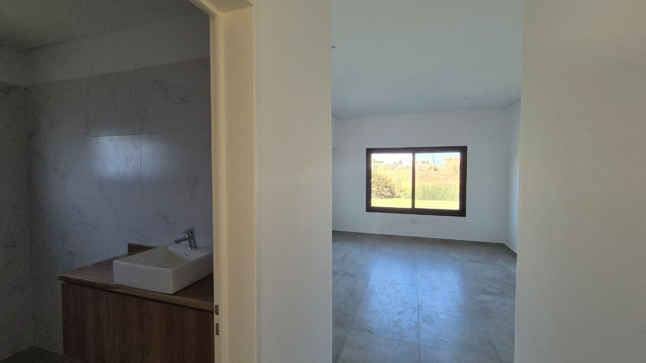 FOR SALE: Brand-new single-story house in Canton Norte overlooking a body of water