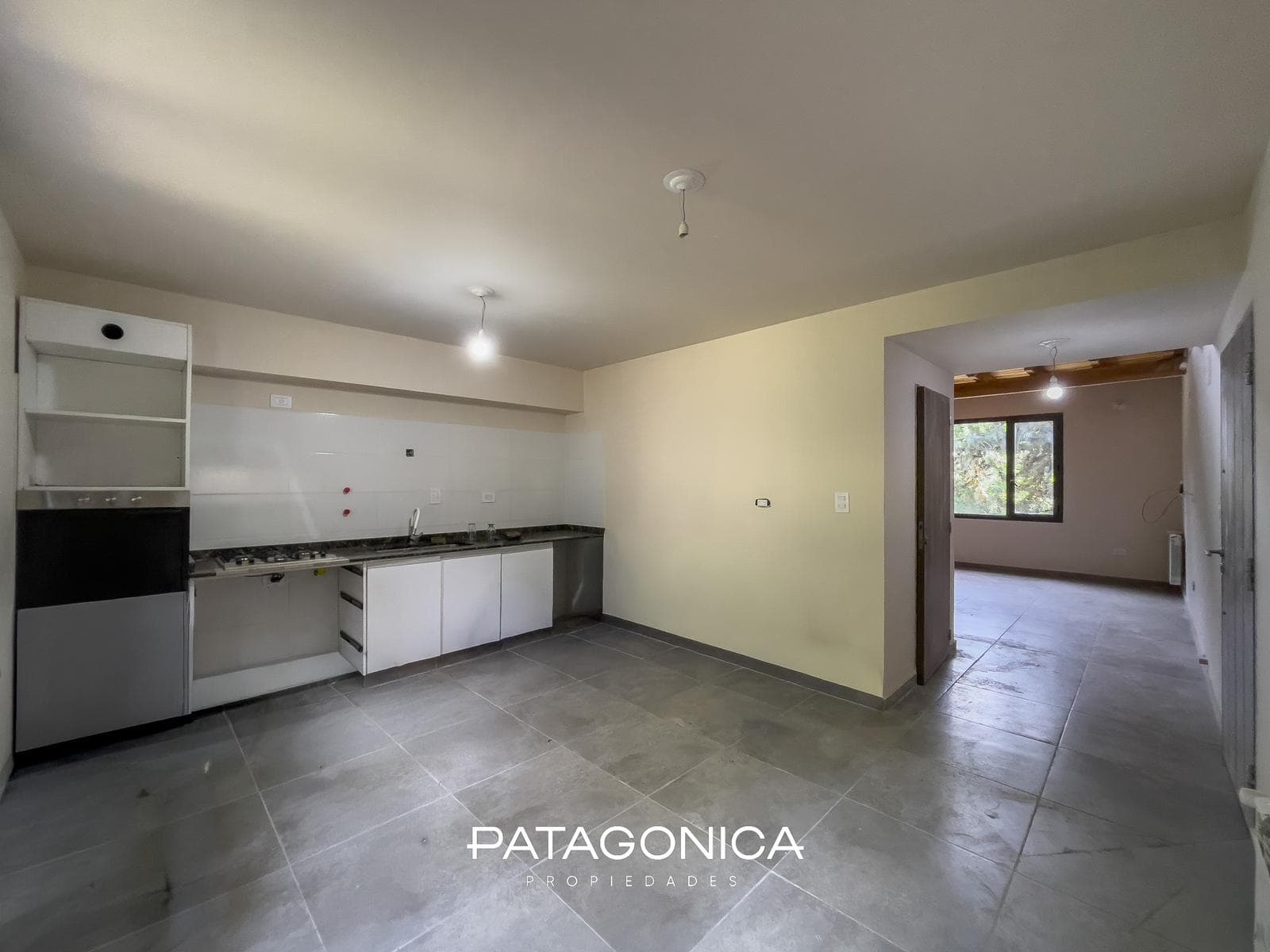 2-Room Apartment with Private Garden and Garage