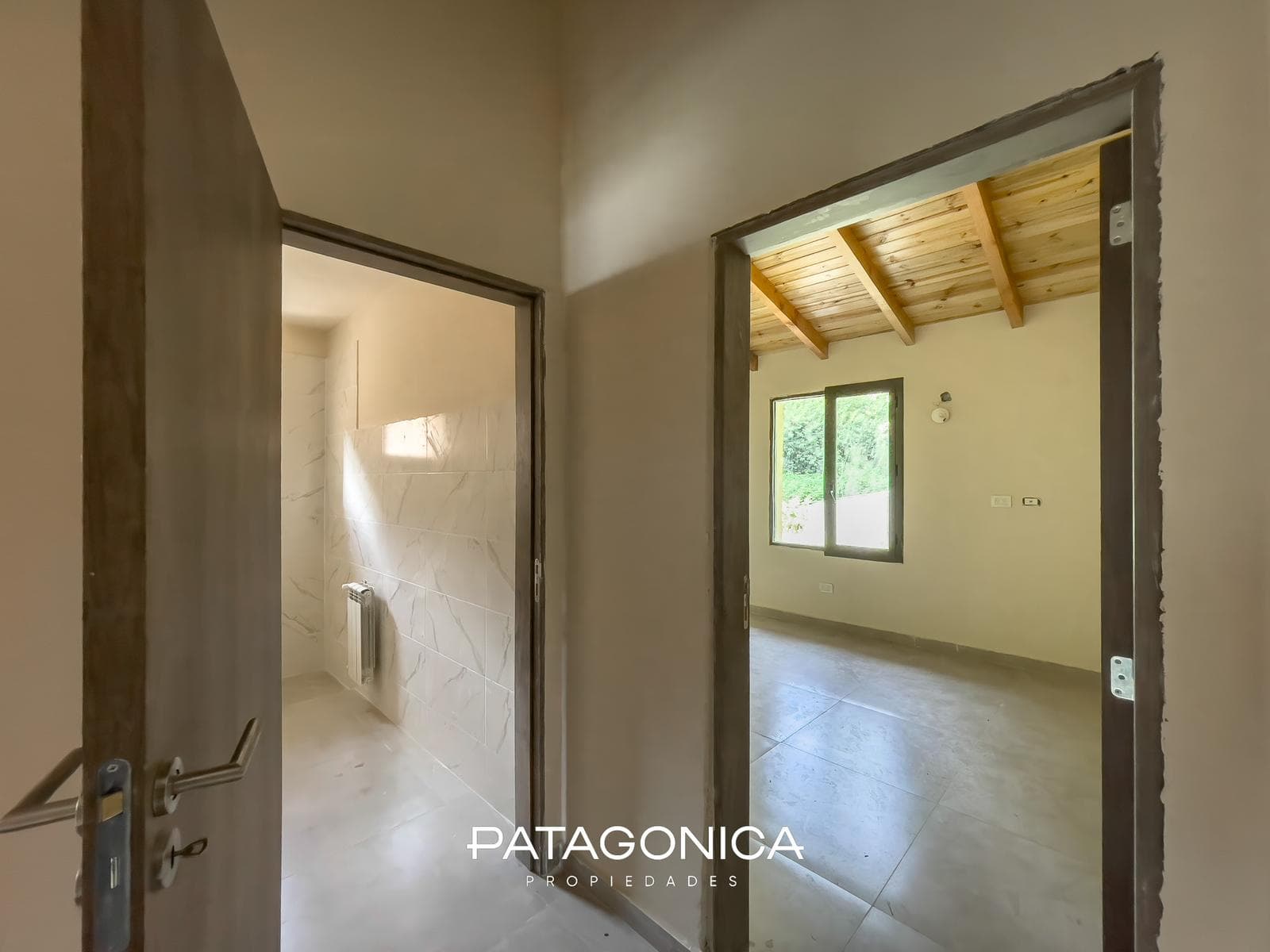 2-Room Apartment with Private Garden and Garage