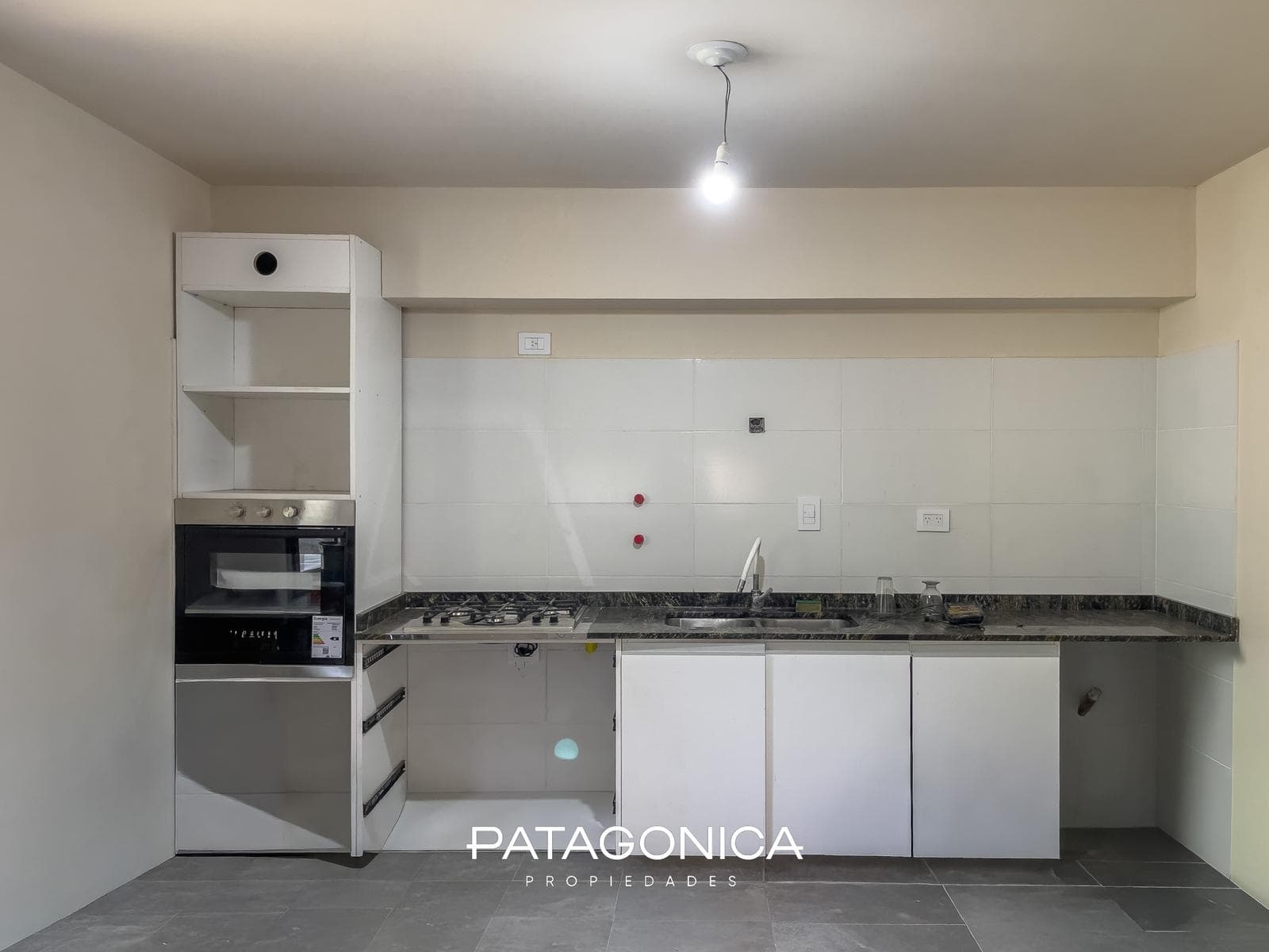 2-Room Apartment with Private Garden and Garage