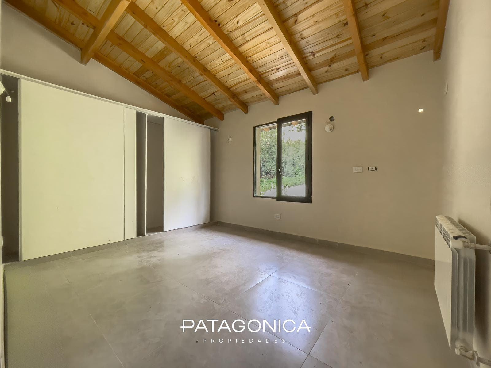 2-Room Apartment with Private Garden and Garage