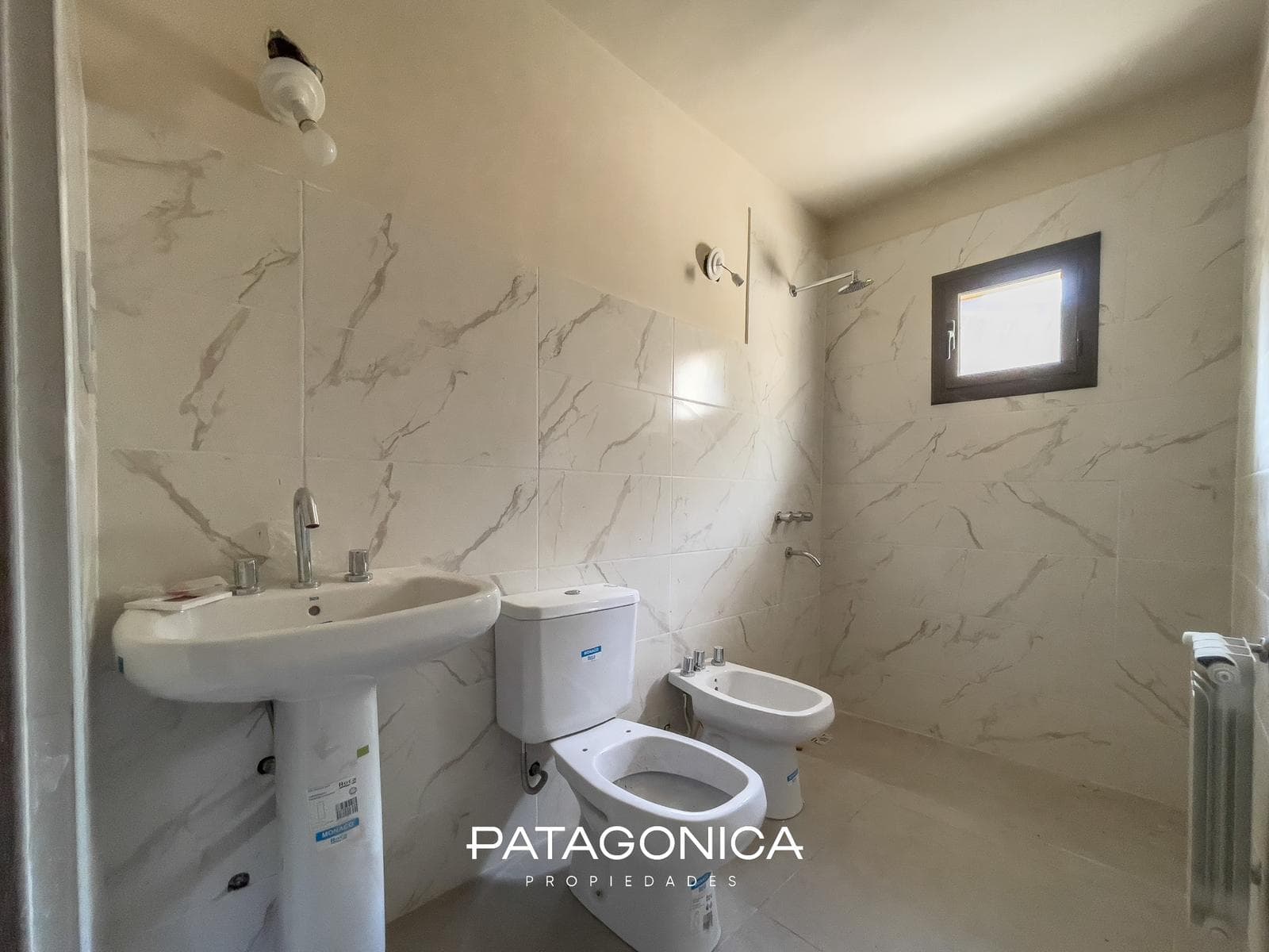 2-Room Apartment with Private Garden and Garage