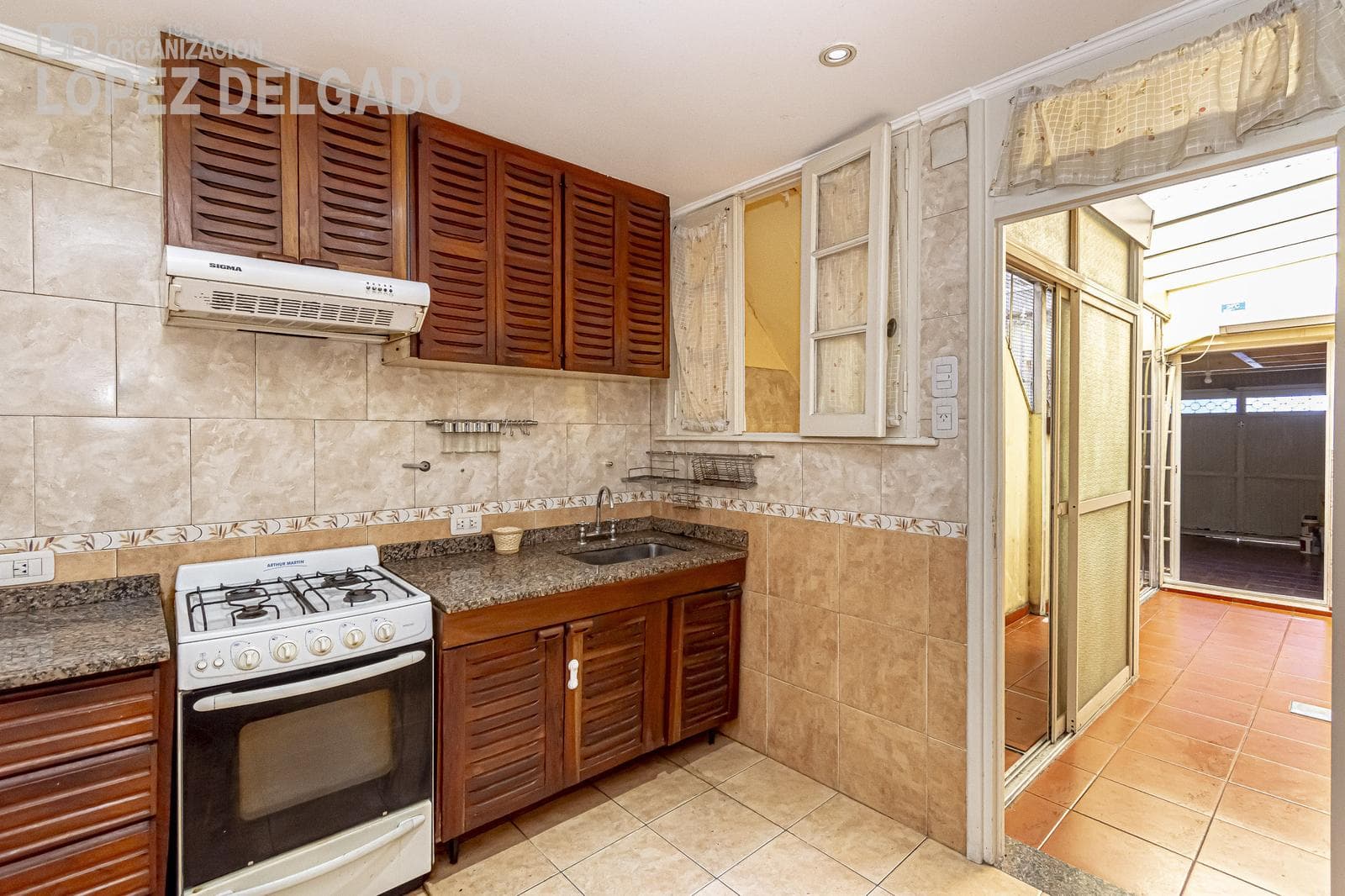 House in Agronomía with a garage, backyard, and terrace
