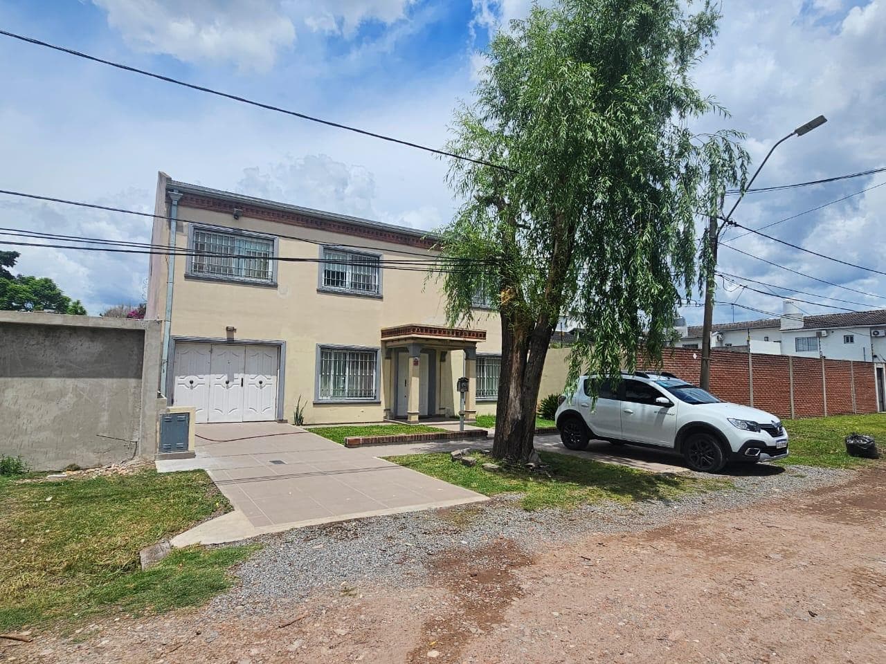 House for sale with a large garden. Credit or trade accepted.