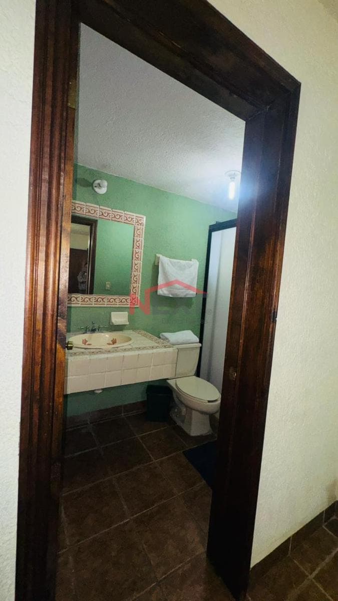"Furnished apartment for rent on the second floor in the Jardines del Valle neighborhood"