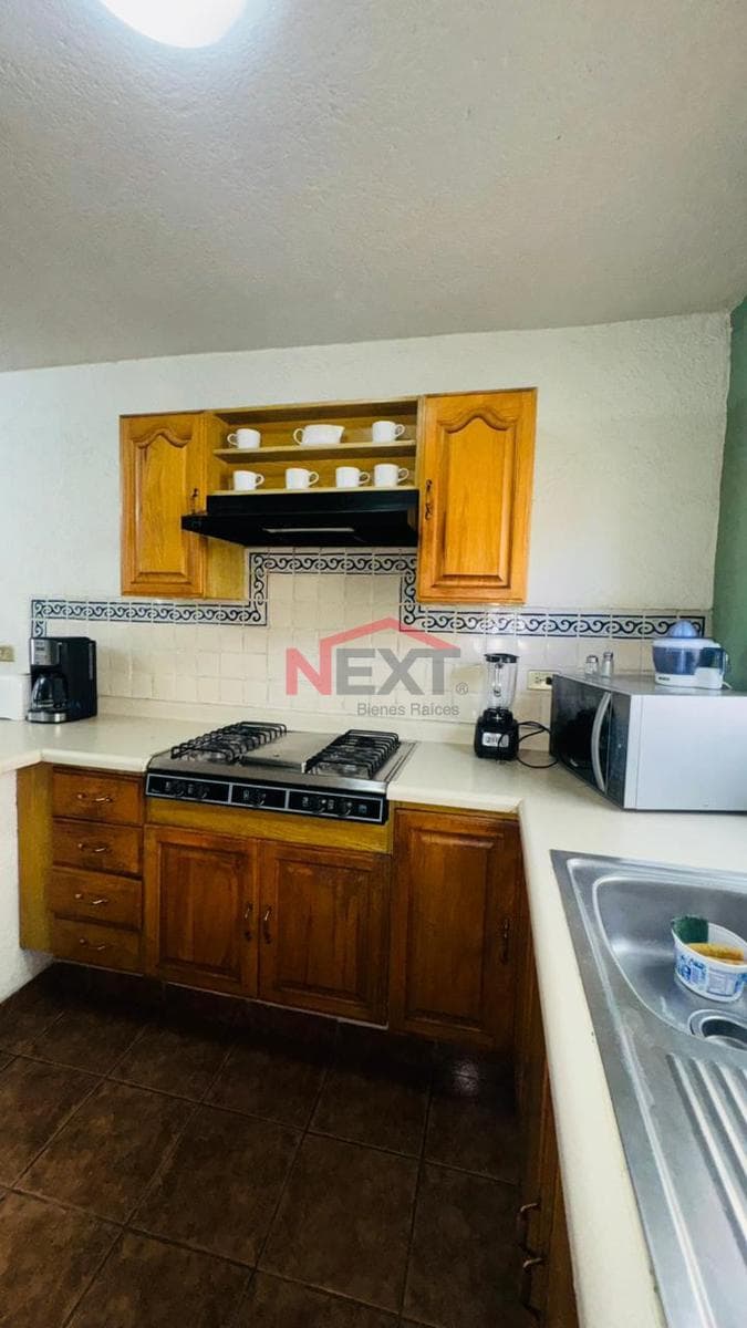 "Furnished apartment for rent on the second floor in the Jardines del Valle neighborhood"