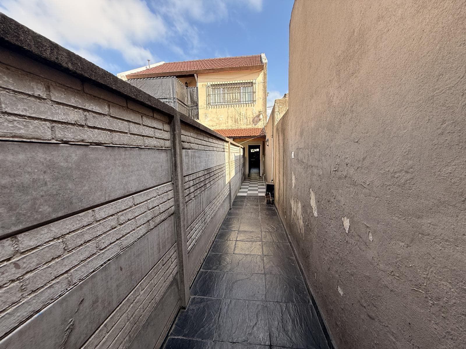 FOR SALE: 4-room townhouse with a PATIO and GRILL in Caseros—NO MAINTENANCE FEES