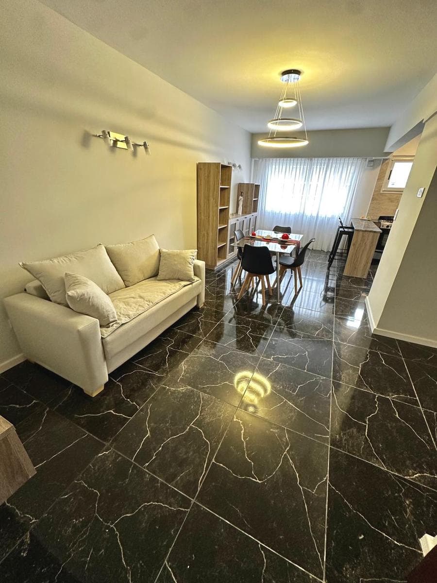 2 VERY SPACIOUS LIVING ROOMS OPENING ONTO THE STREET