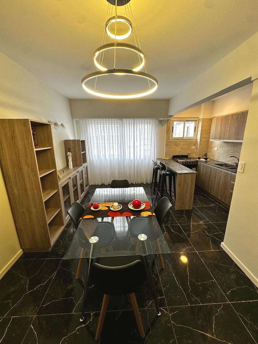 2 VERY SPACIOUS LIVING ROOMS OPENING ONTO THE STREET